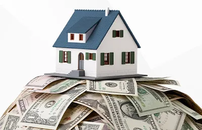 Rebates: Image shows a house sitting on top of a pile of money